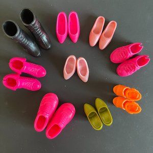 Assortment of Barbie doll shoes and boots
